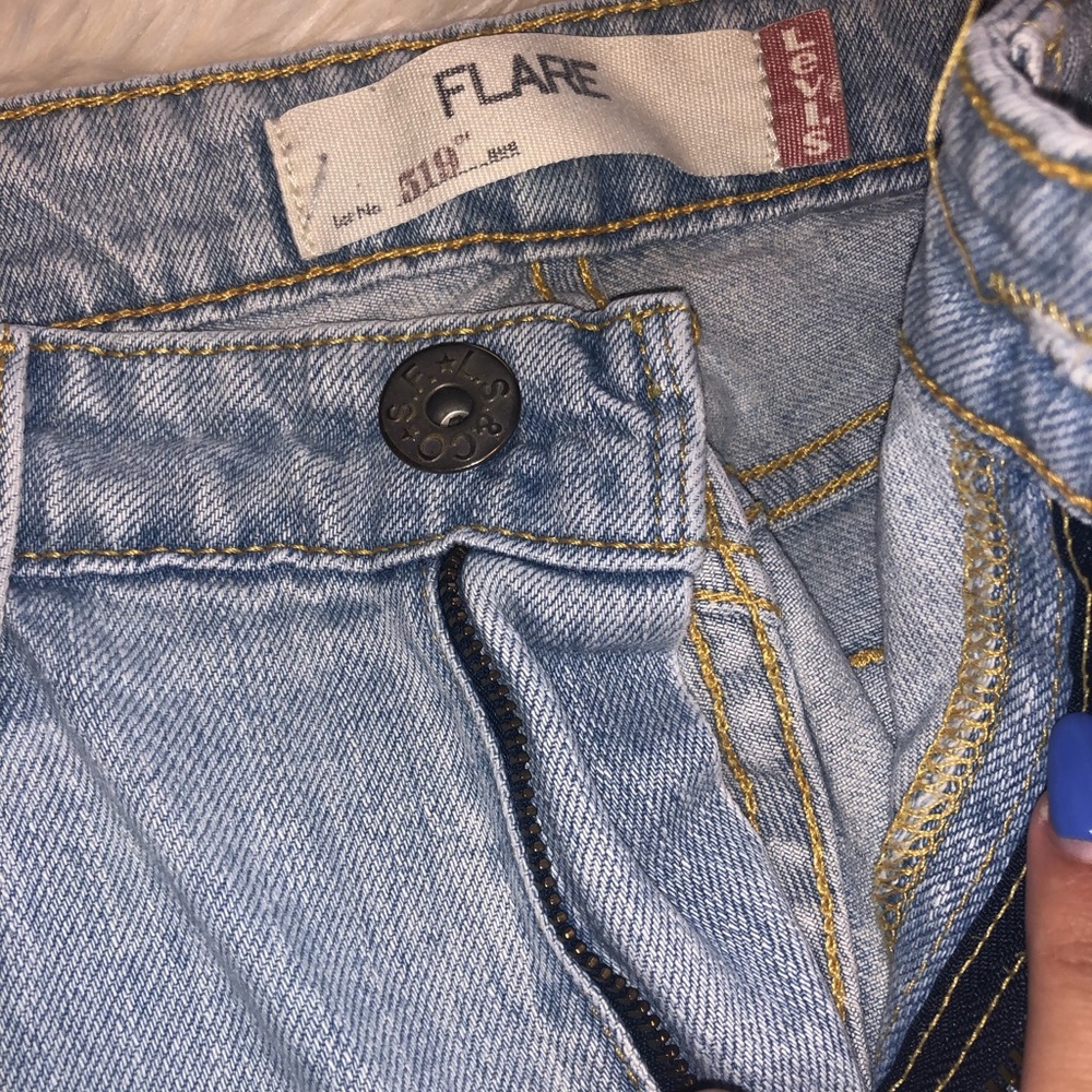Light blue distressed Levi’s
